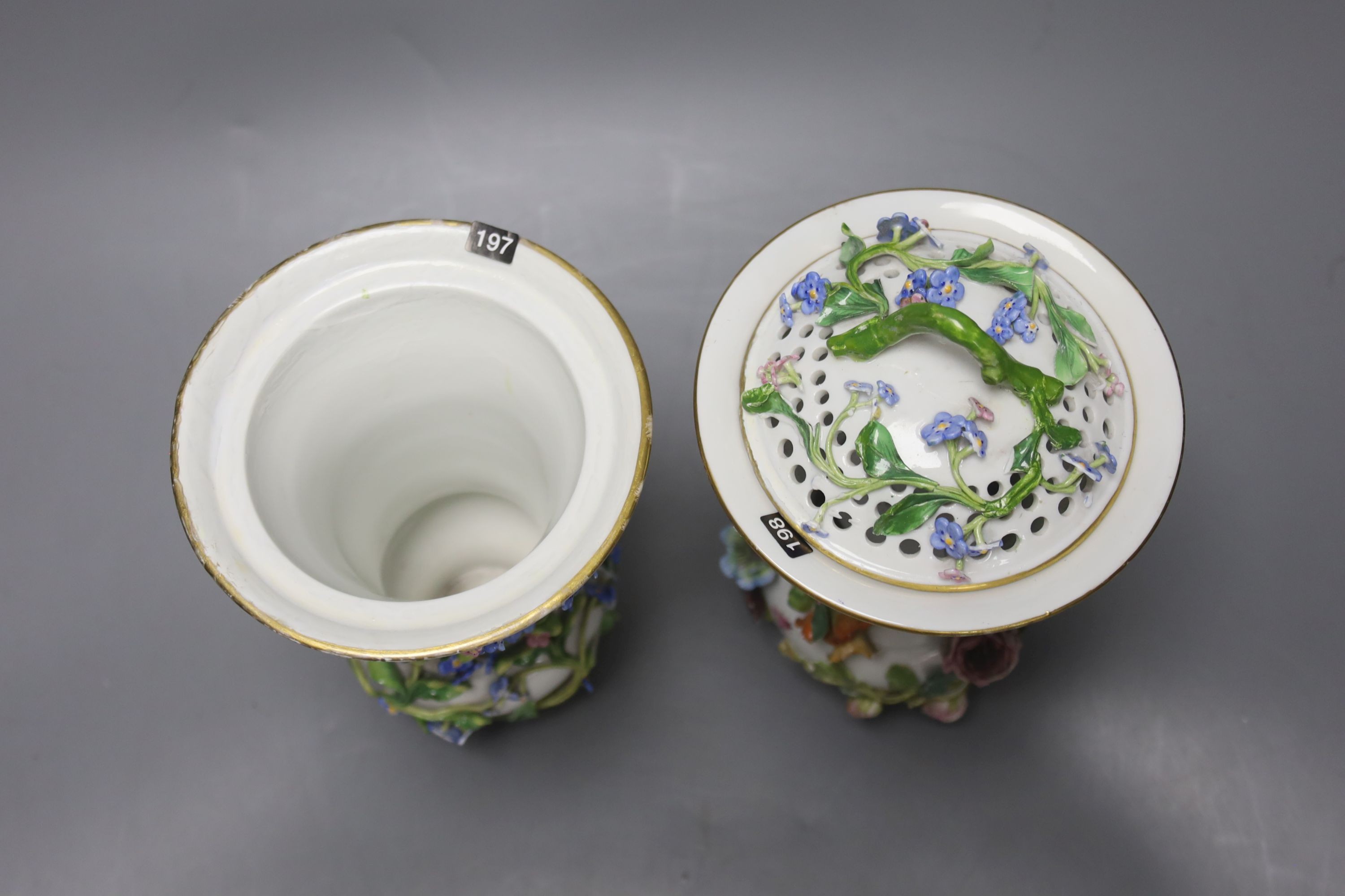 Two similar 19th century Meissen pot pourri vases and one cover, tallest 20cm